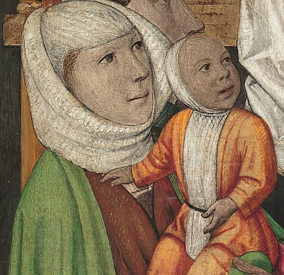 Medeltida målning av en mor med barn i famnen.