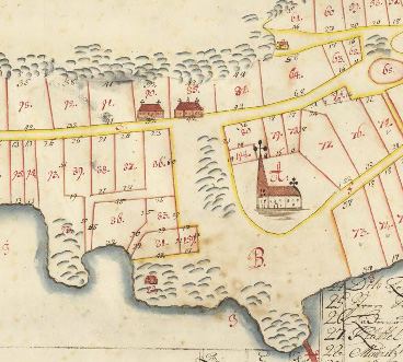 Karta med tomter och kyrka samt ett par hussymboler.