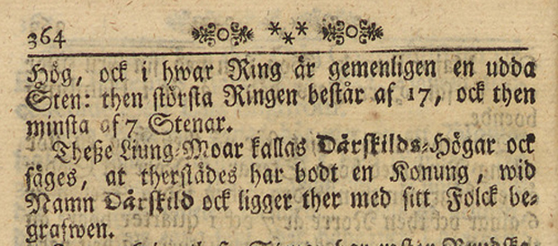 Gulnad boksida med text i frakturstil. 